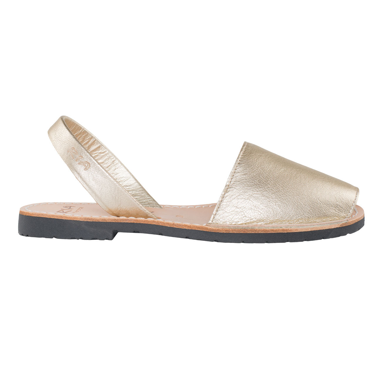 Goldige Avarca Sandale für Damen mit schwarzer Sohle im Profil